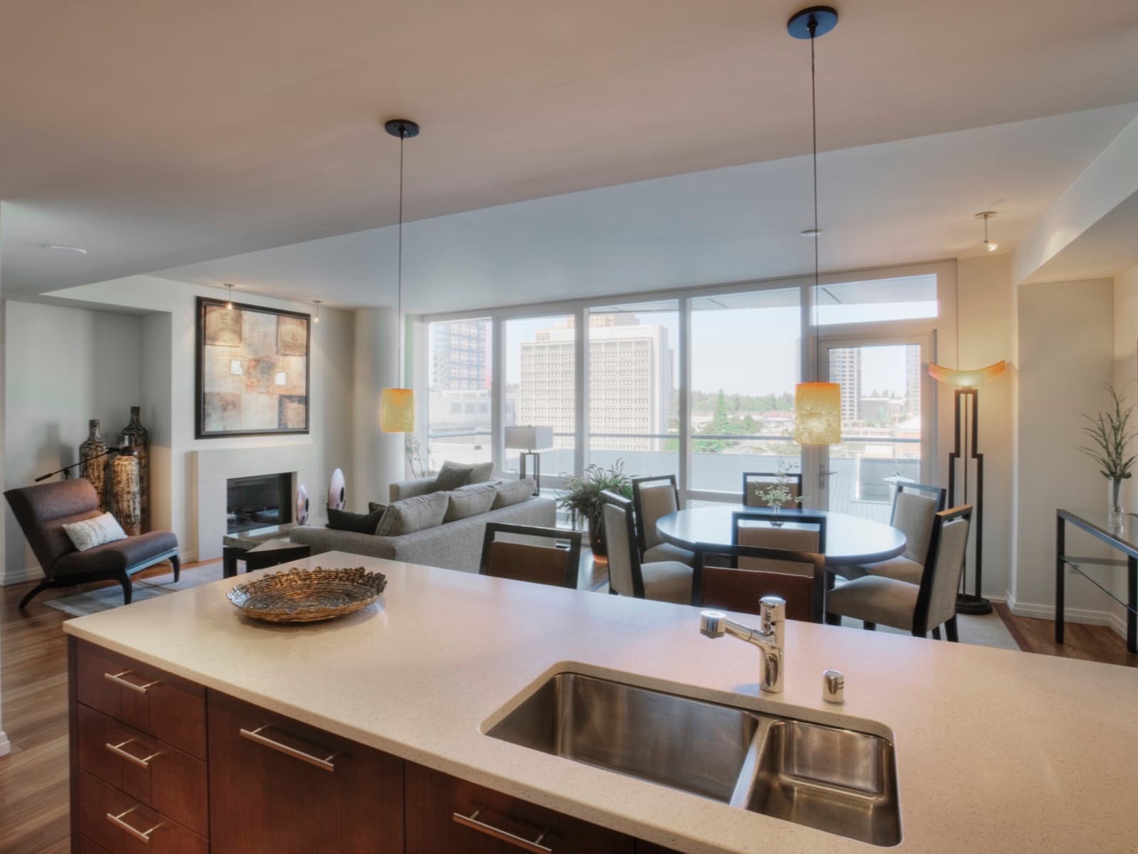 Modern living room with kitchen island.
